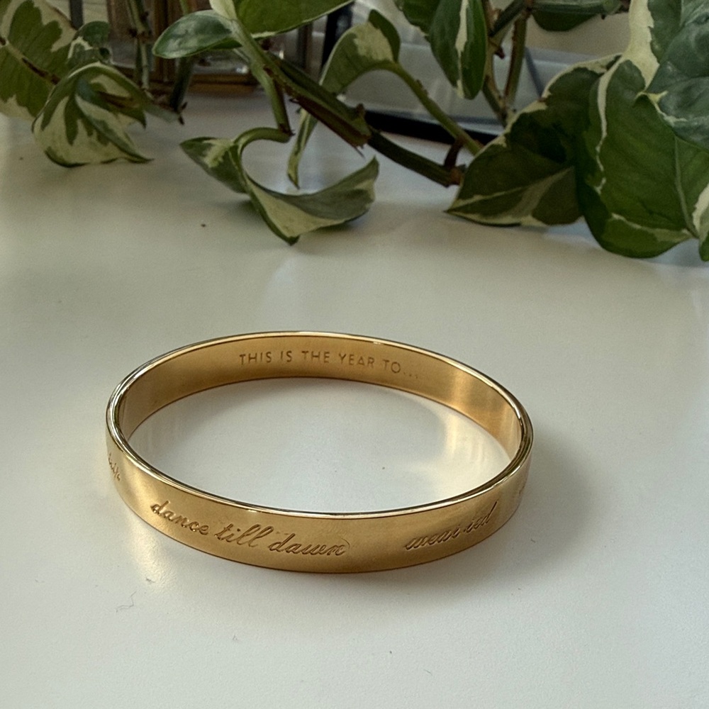 Kate spade gold idiom bangle bracelet “this is the year to…”